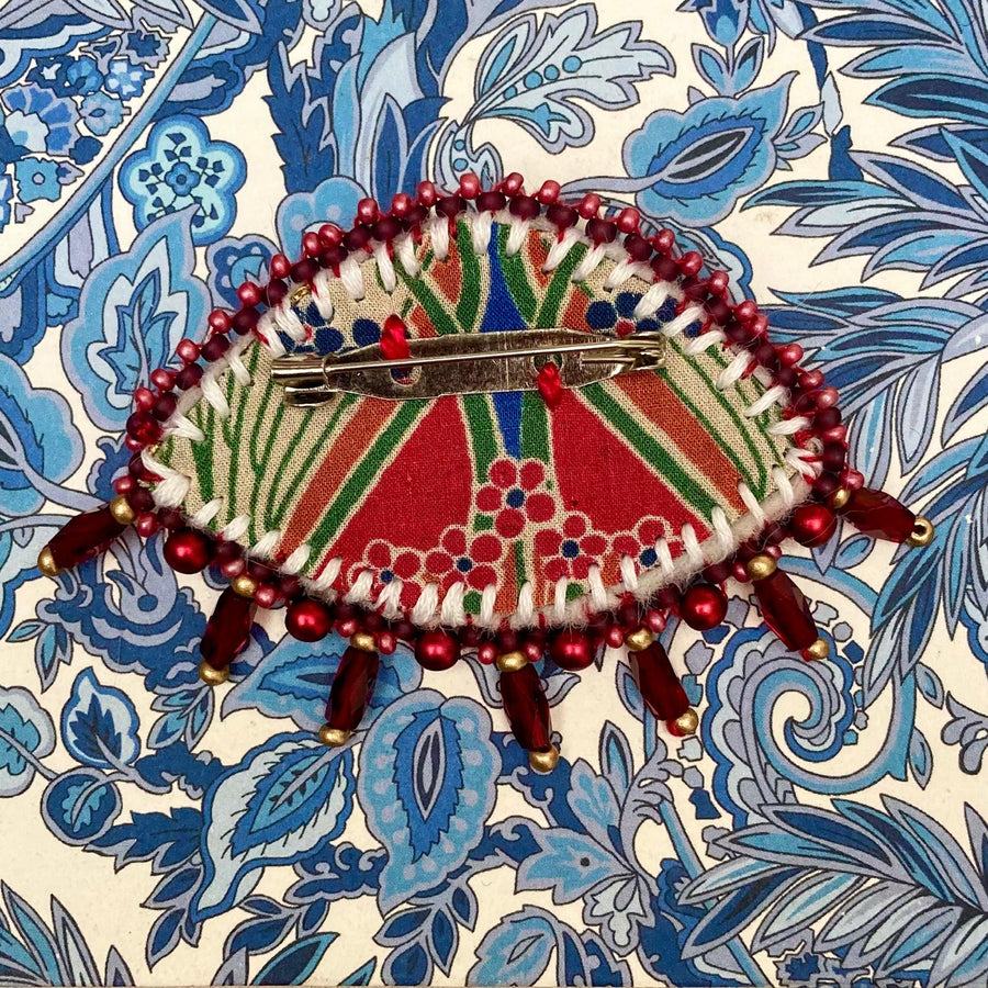 Beaded Brooch: Eye in Reds & Blues